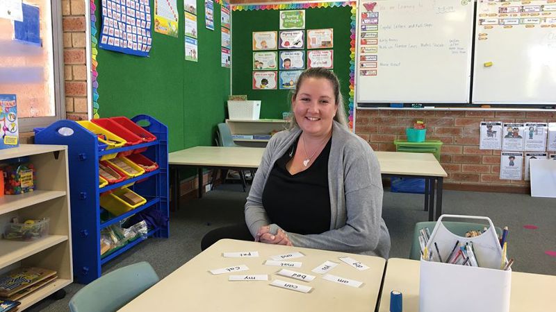 ITAC student pictured in a school classroom.